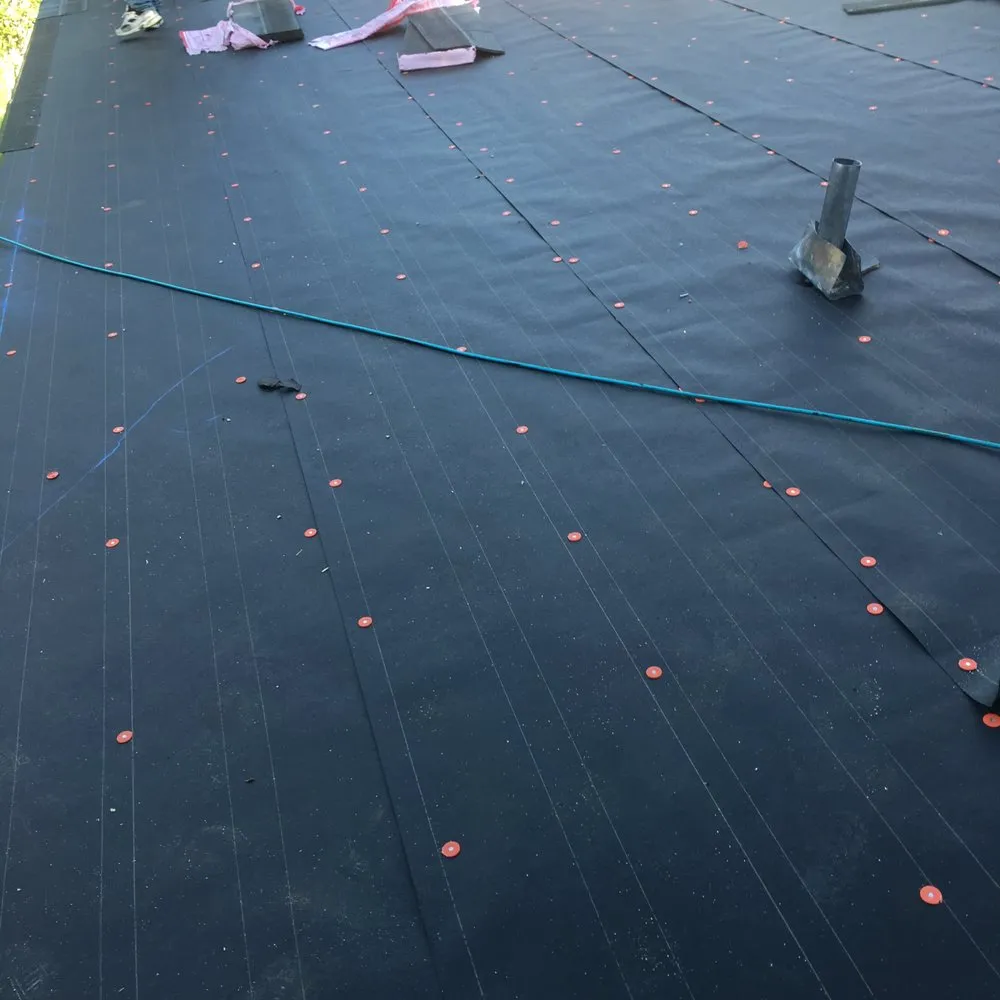 Slide of Mercedes Roofing