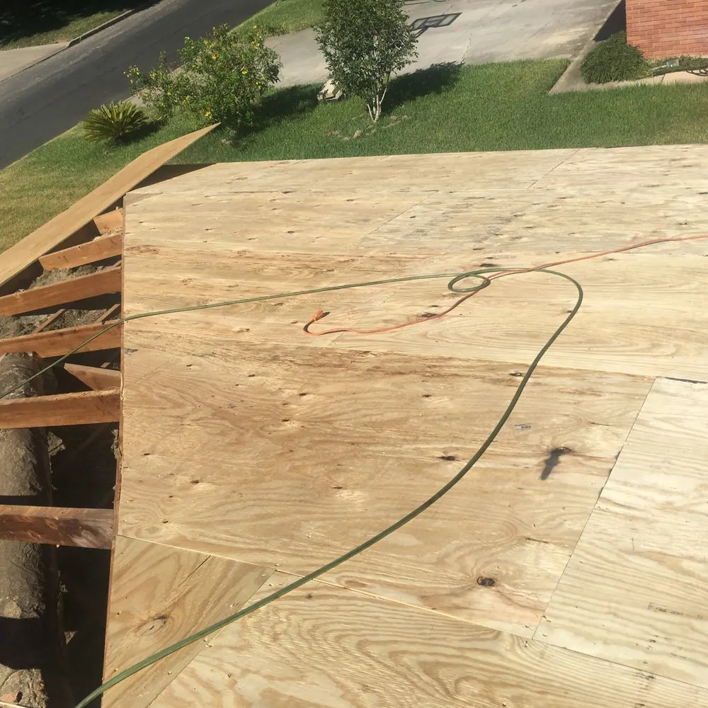 Slide of Mercedes Roofing