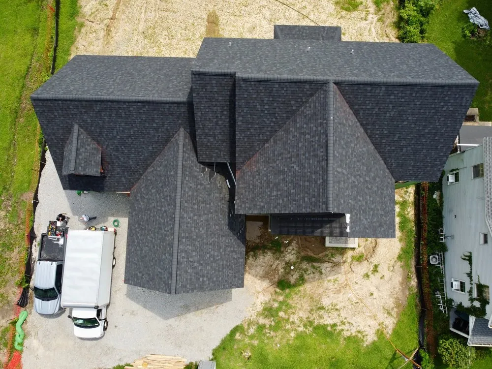 Emergency flat roof repair for residential properties in St. Louis, MO by Meridian Roofing and Renovation
