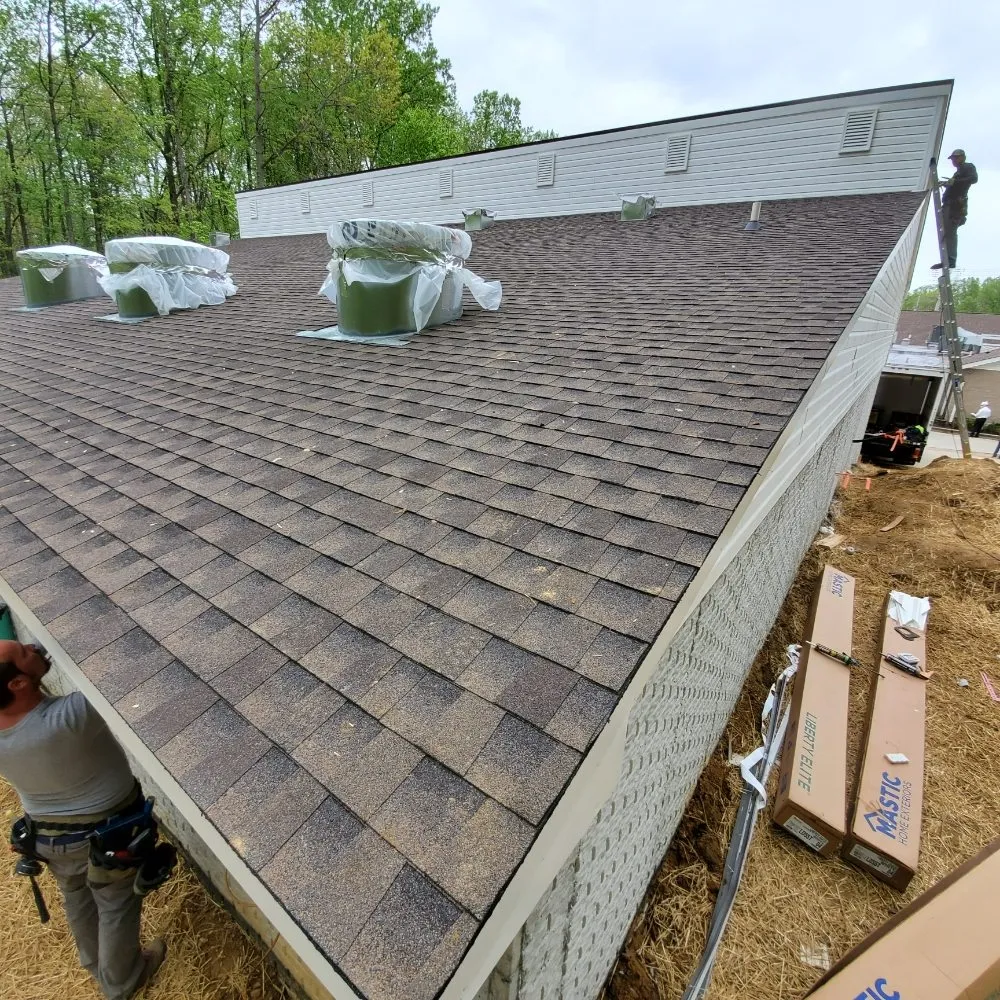 Slide of Merit Roofing and Exteriors