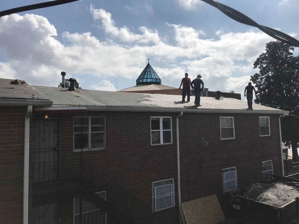 Slide of Merk Roofing