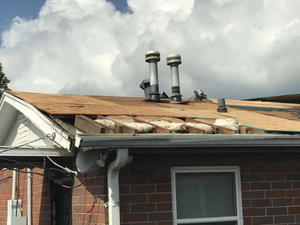 Slide of Merk Roofing