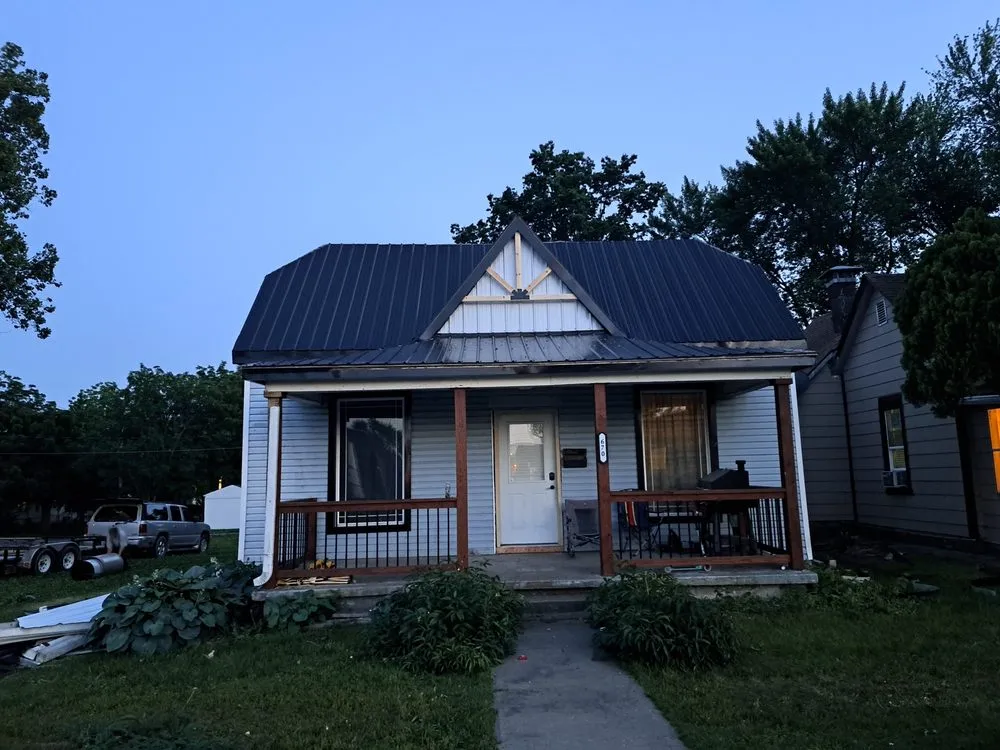 Slide of Merv's Roofing & Construction