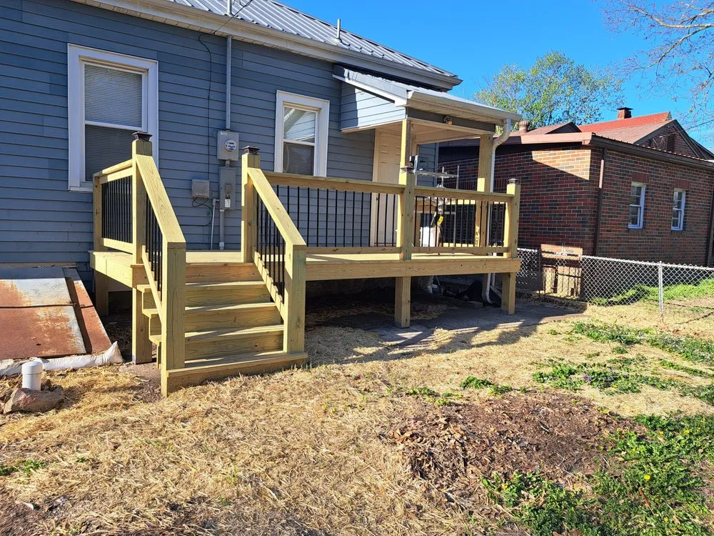 Slide of Merv's Roofing & Construction