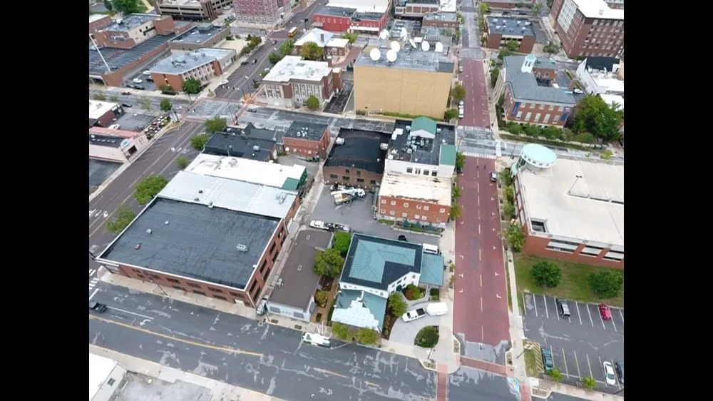 Slide of Merv's Roofing & Construction