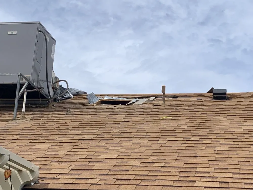 Slide of Mesa Roofing