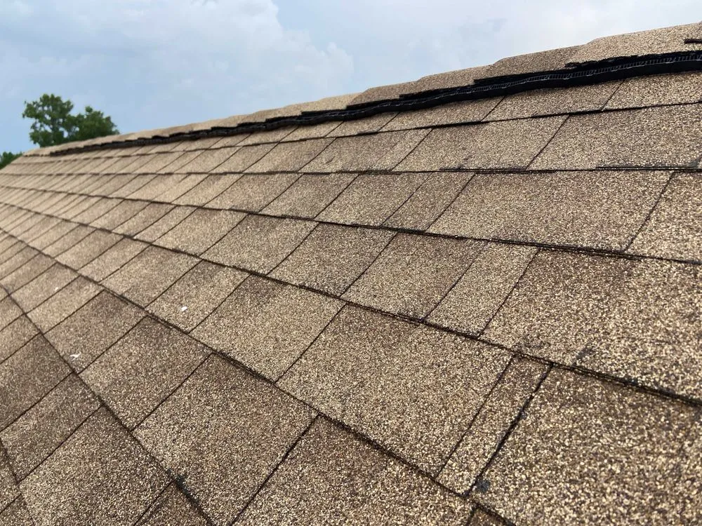 Slide of Metal & Shingles Roofing