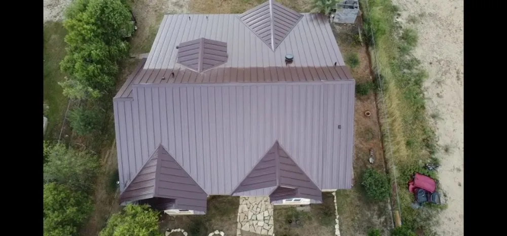 Slide of Metal Master Roofing