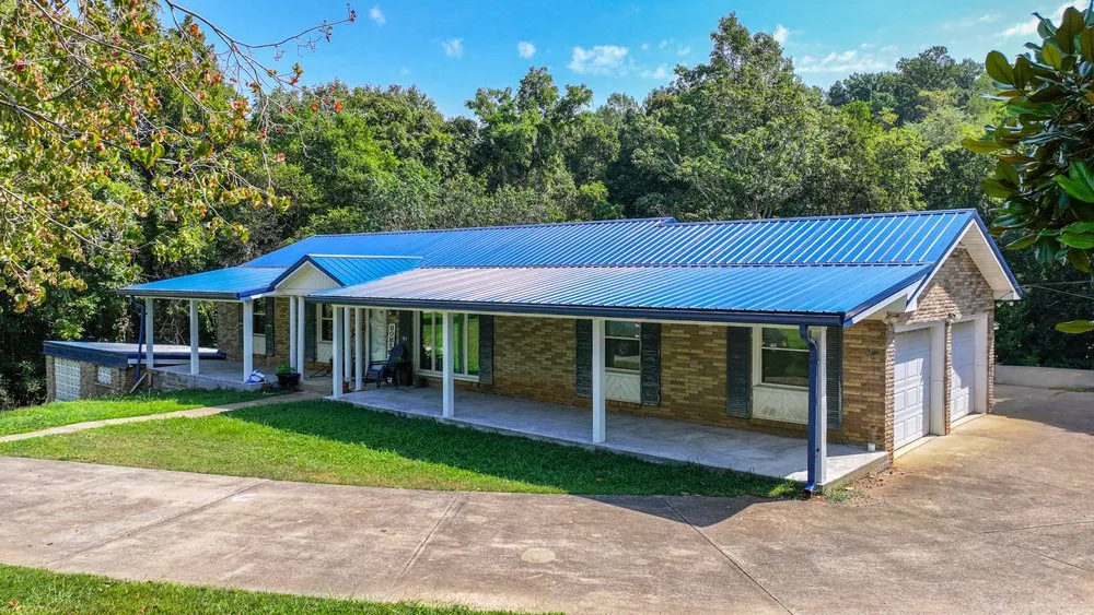 Slide of Metal Masters Roofing