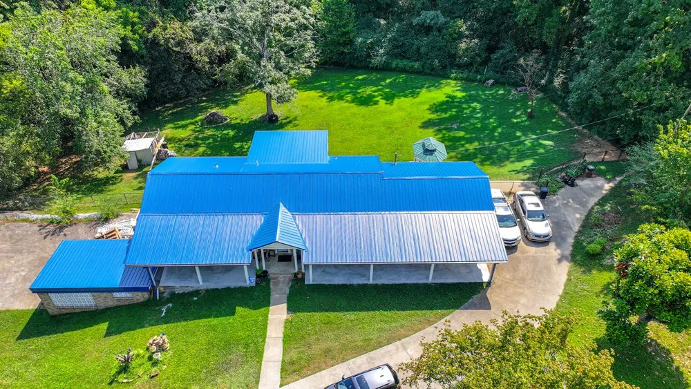 Slide of Metal Masters Roofing