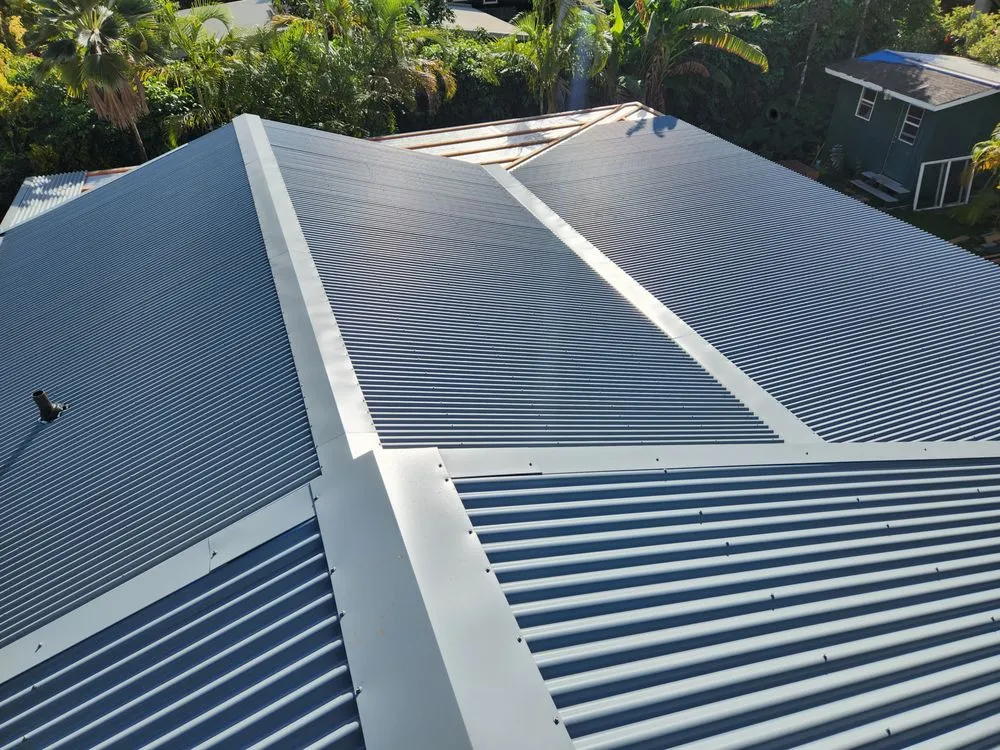 Slide of Metal Roof Pros-Kaua'i Roof Installers