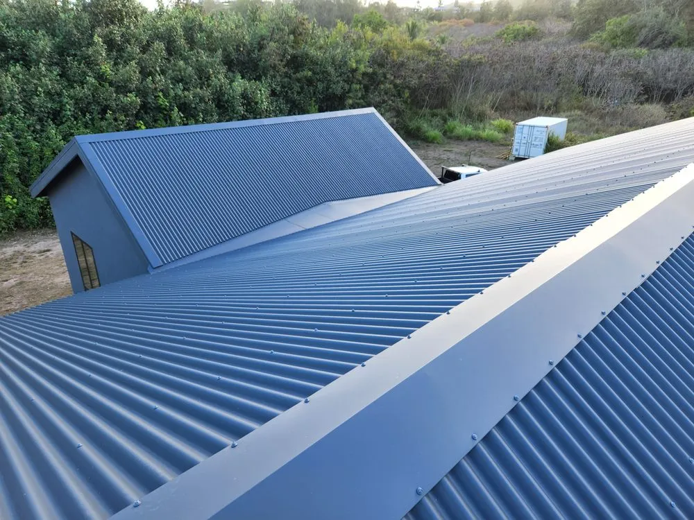 Slide of Metal Roof Pros-Kaua'i Roof Installers