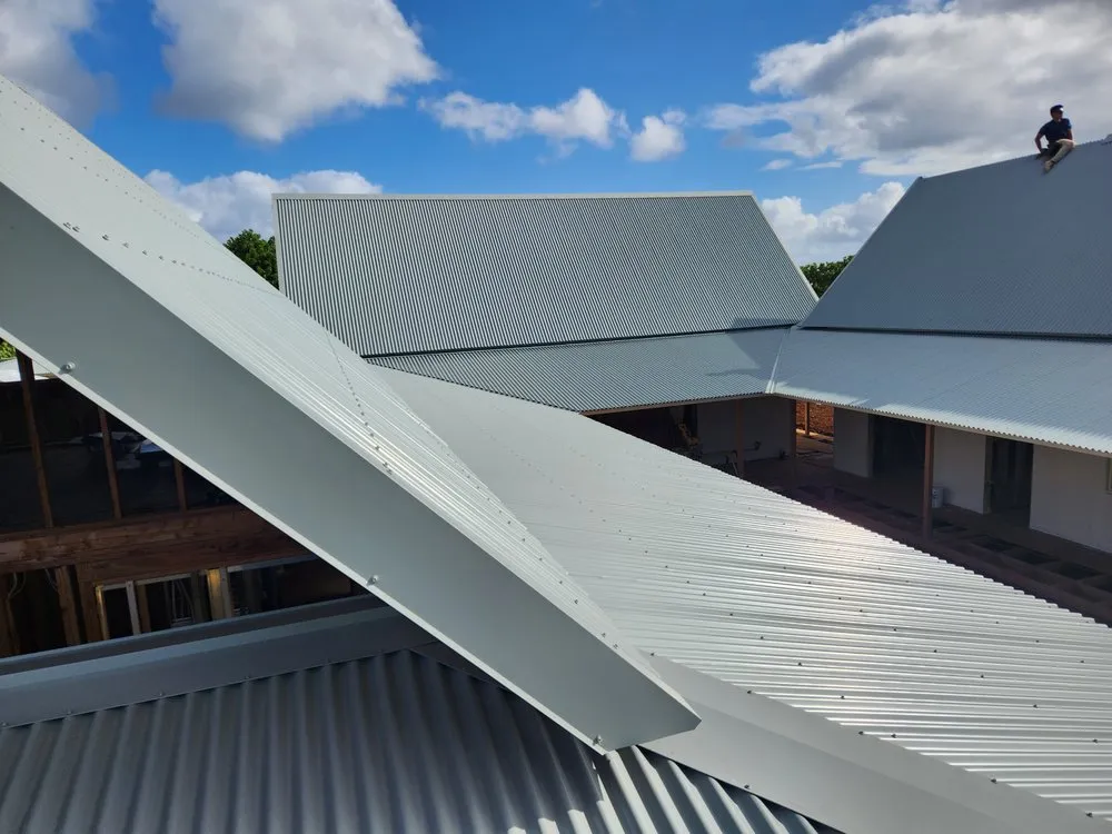 Slide of Metal Roof Pros-Kaua'i Roof Installers