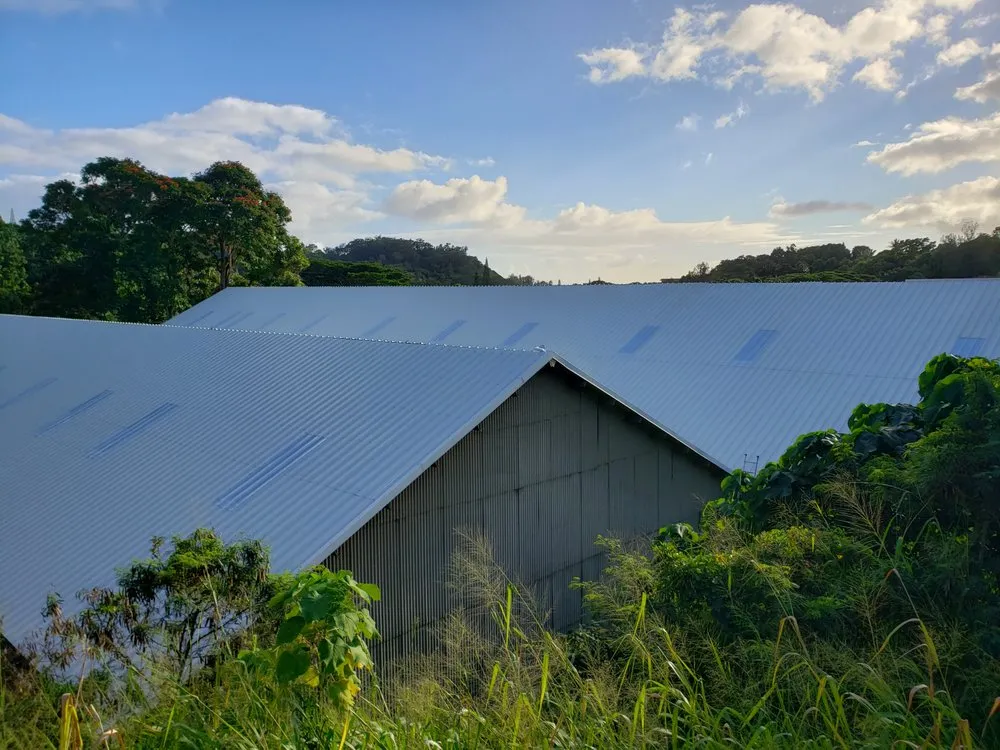 Slide of Metal Roof Pros-Kaua'i Roof Installers