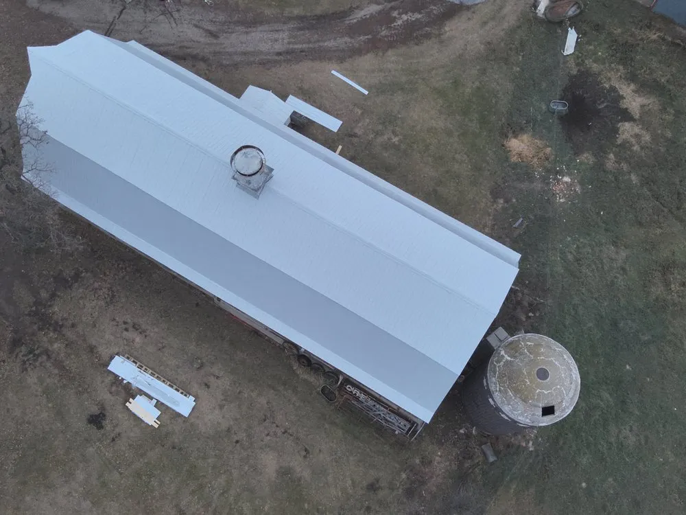 Slide of Metal Roofers