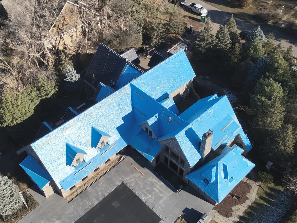 Slide of Metal Roofers