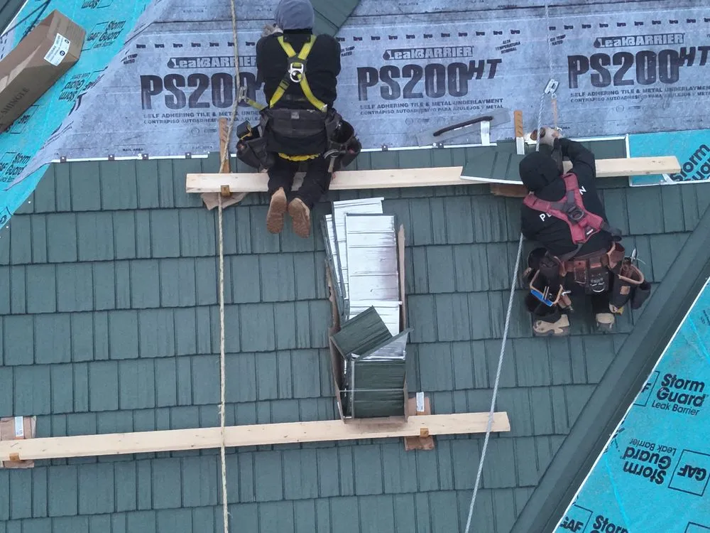 Slide of Metal Roofers