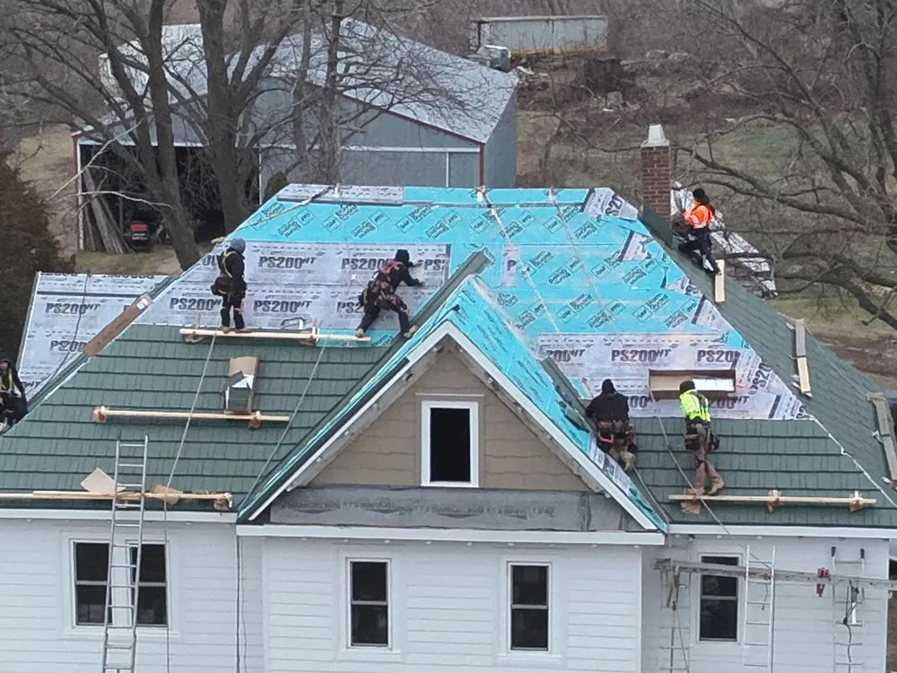 Slide of Metal Roofers