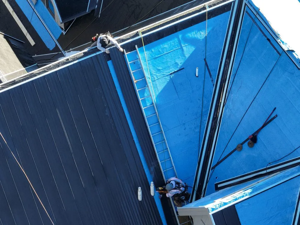 Slide of Metal Roofers