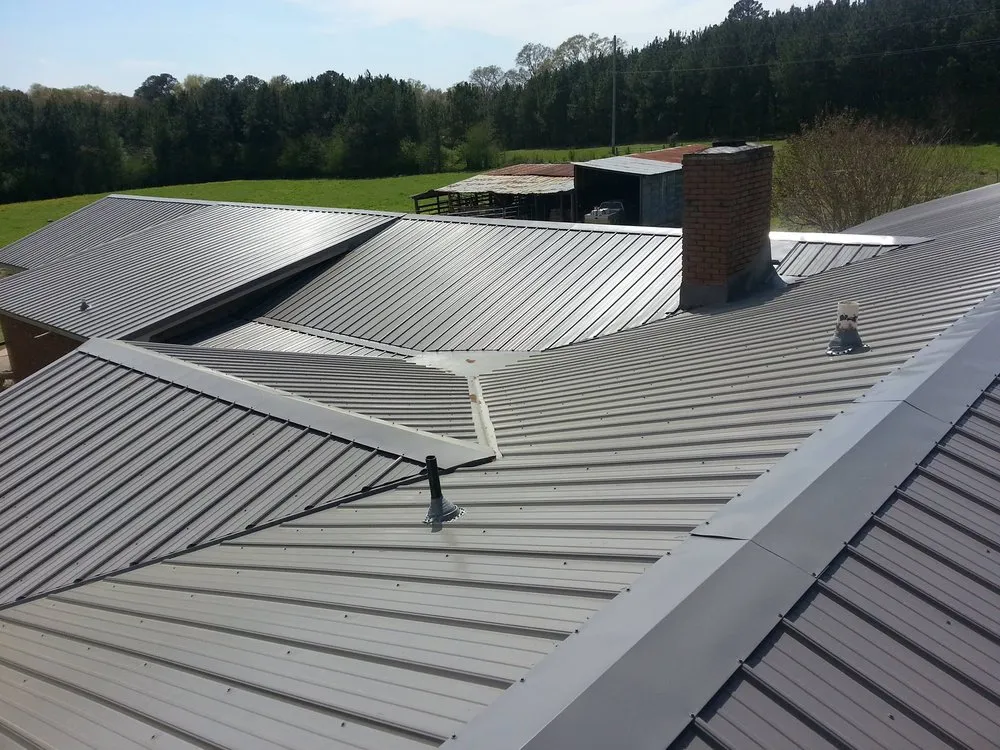 Slide of Metal Roofing Contractors