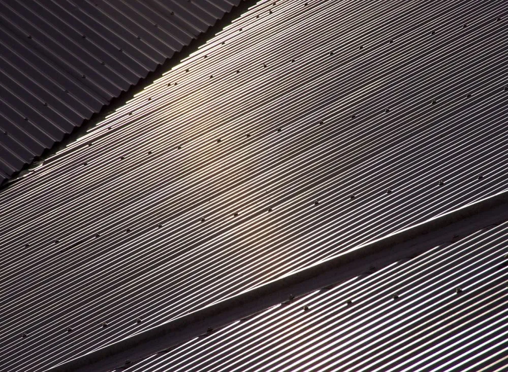 Slide of Metal Roofing Rochester
