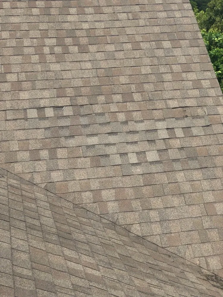 Slide of Metro Roof Pros