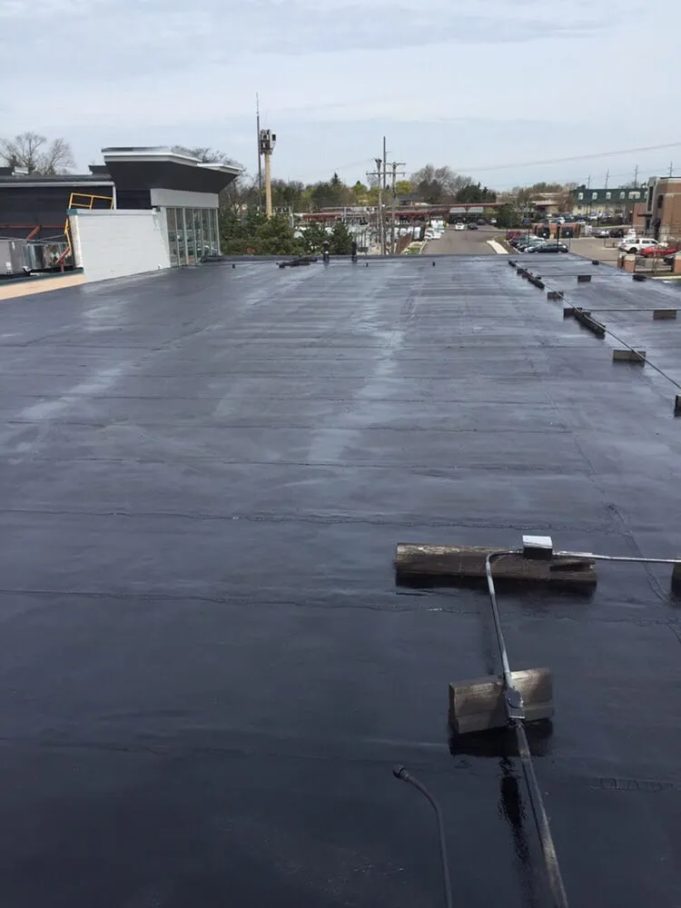 Slide of Metro Roofing