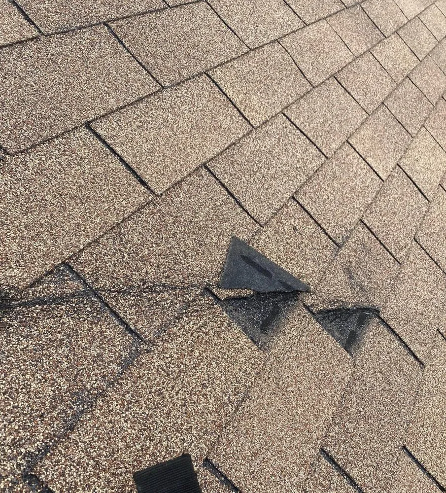 Slide of Metro Roofing