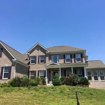 Slide of Metropolitan Roofing and Exteriors