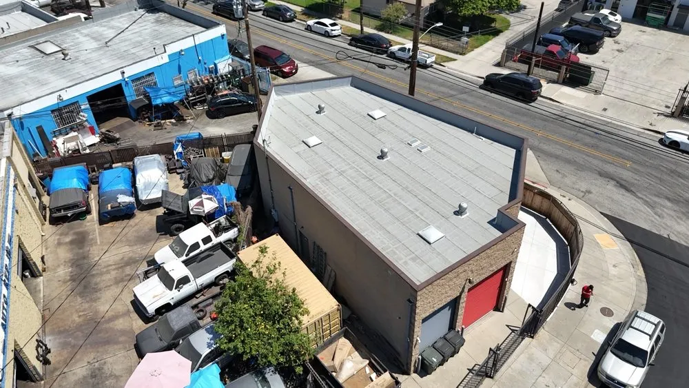 Slide of Meza Roofing Systems