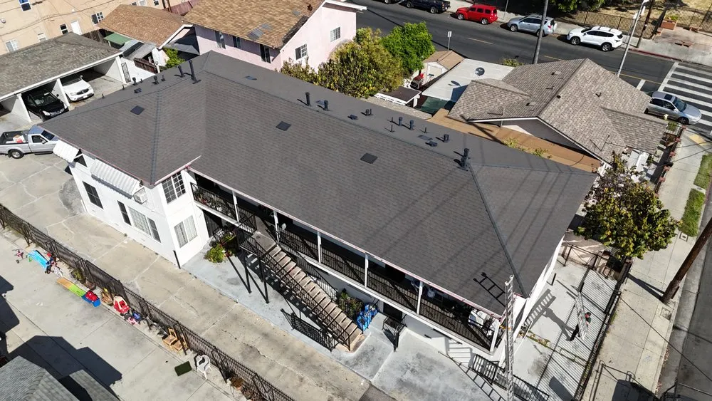 Slide of Meza Roofing Systems