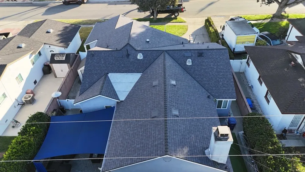 Slide of Meza Roofing Systems