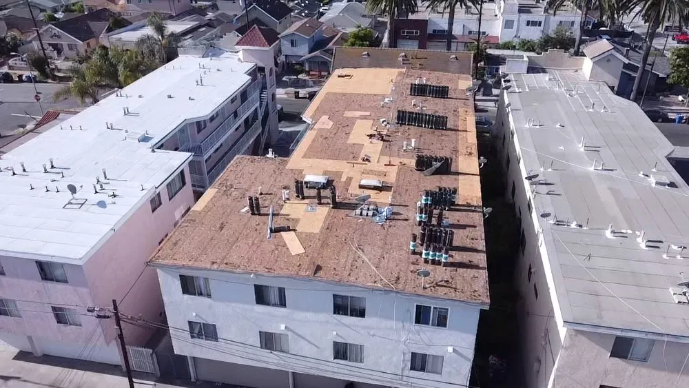 Slide of Meza Roofing Systems