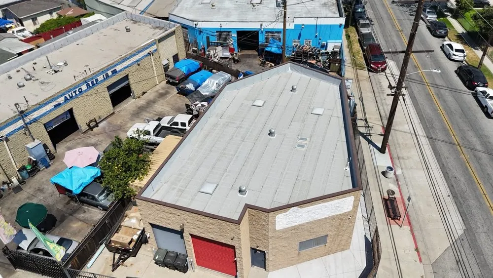 Slide of Meza Roofing Systems