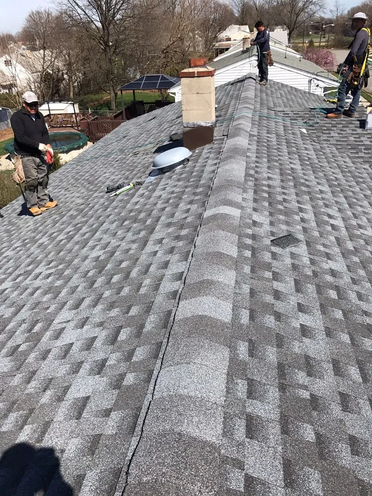 Slide of Mezini Roofing