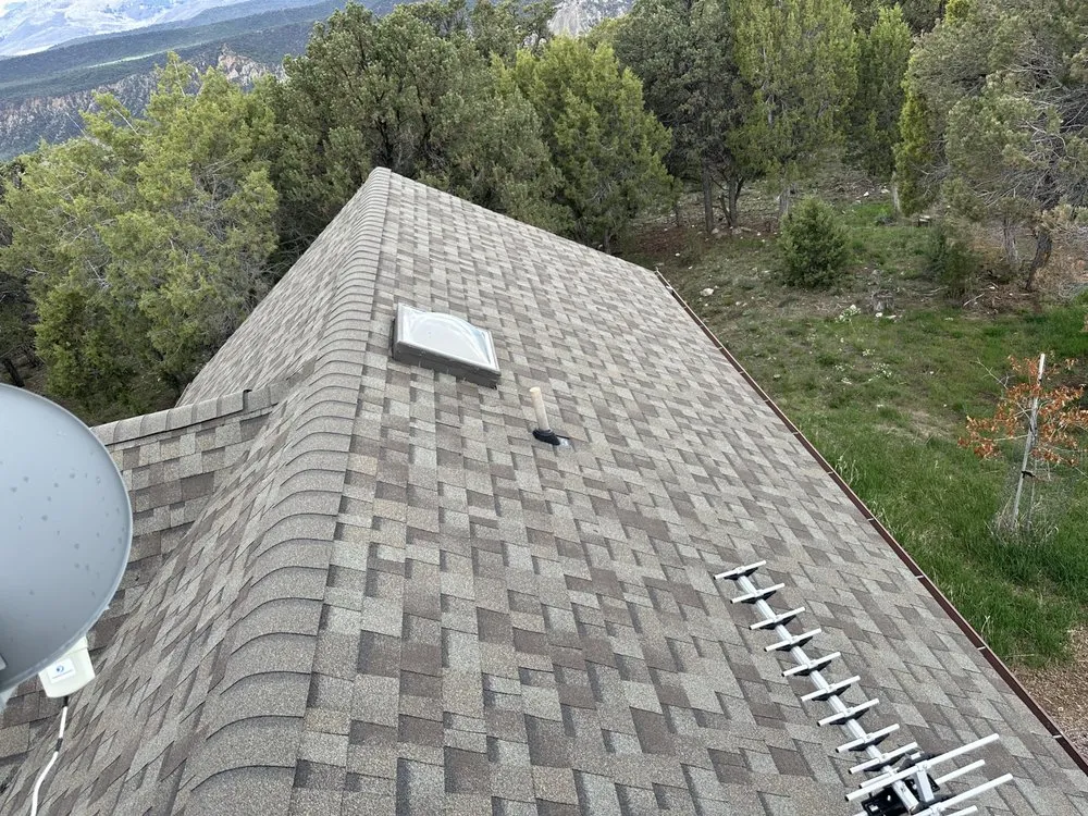 Slide of M&F Roofing