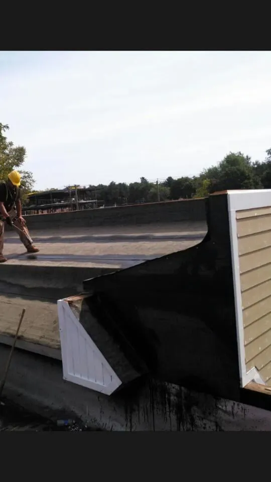 Slide of M.F.I Roofing Construction