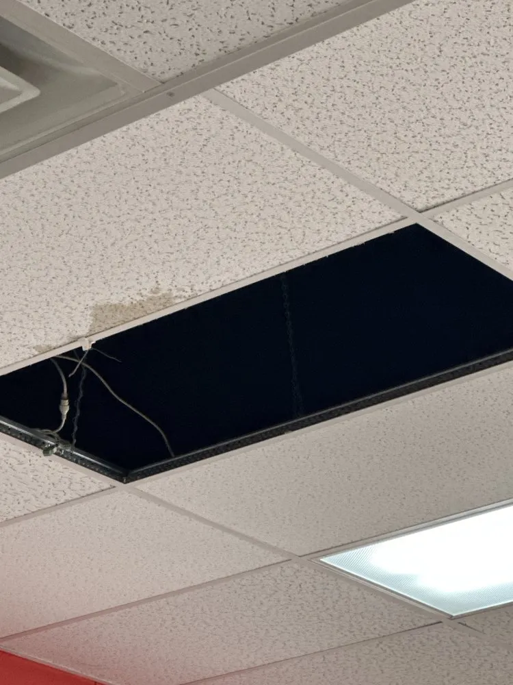 Slide of MGI Roofing