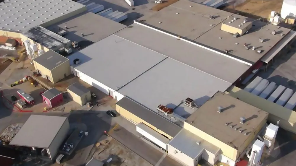 Slide of MGI Roofing