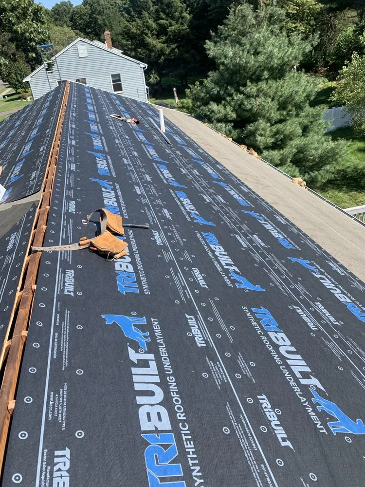 Slide of MGT Roofing Services