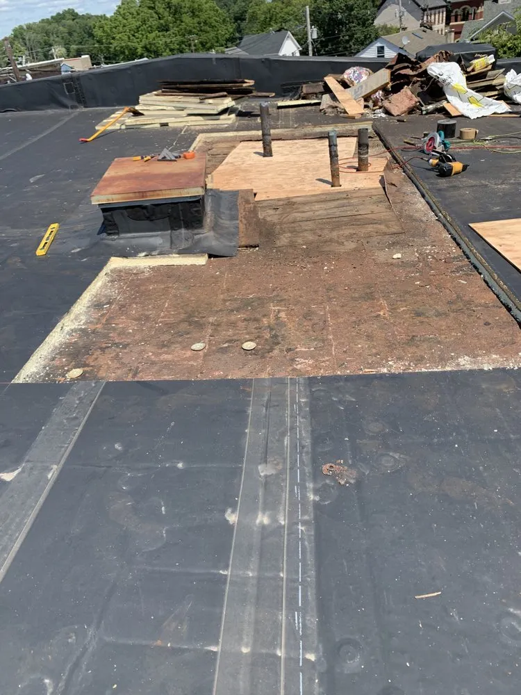 Slide of MGT Roofing Services