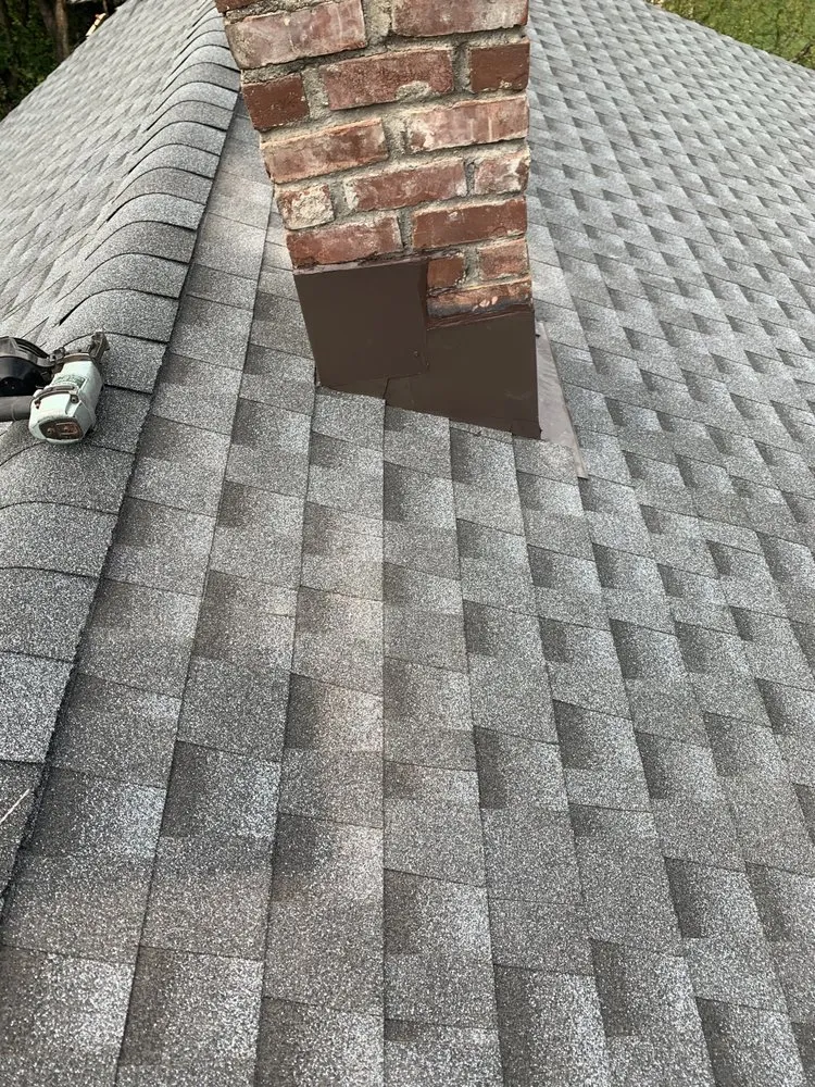 Slide of MGT Roofing Services