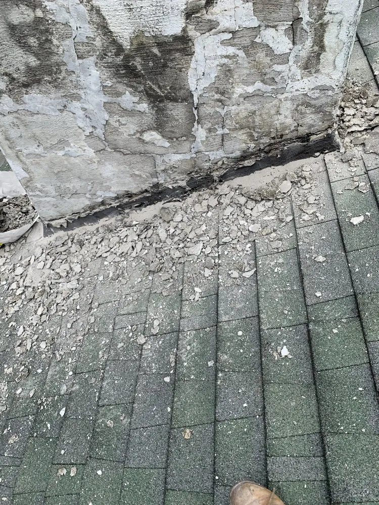 Slide of MGT Roofing Services