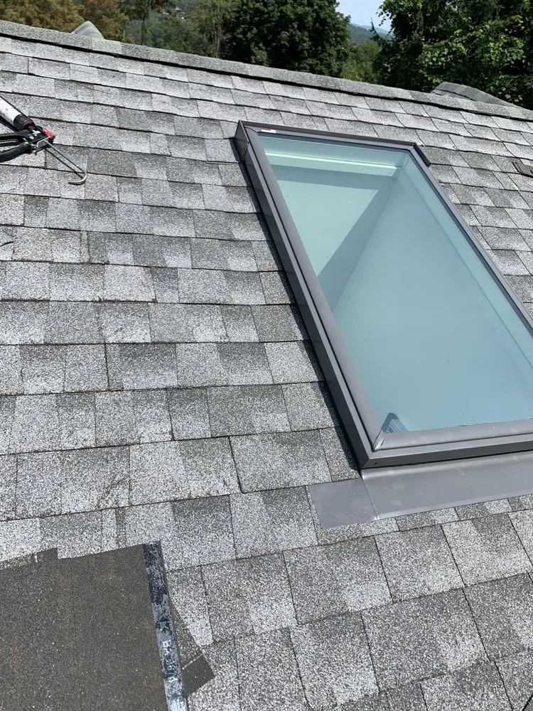 Slide of MGT Roofing Services