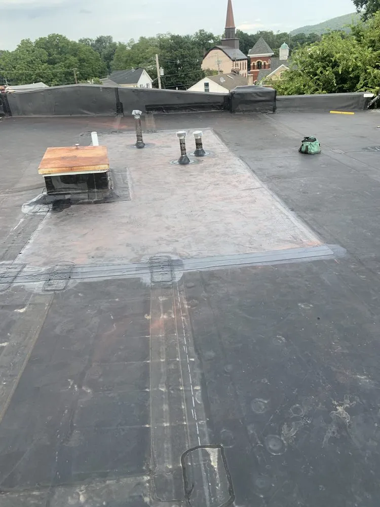 Slide of MGT Roofing Services