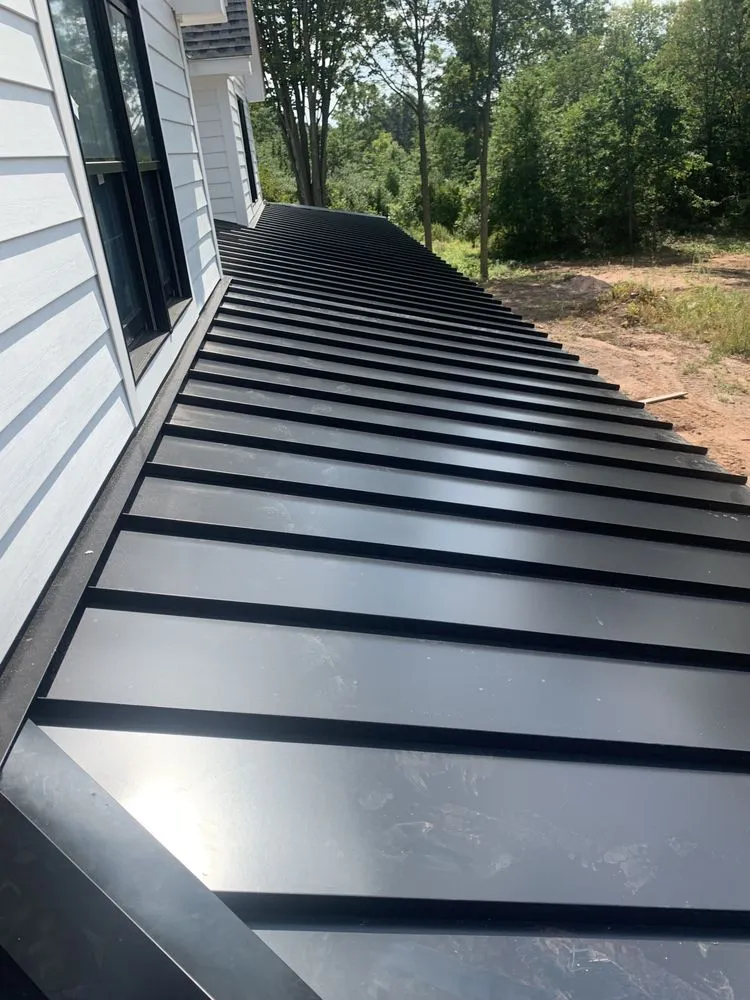 Slide of MGT Roofing Services