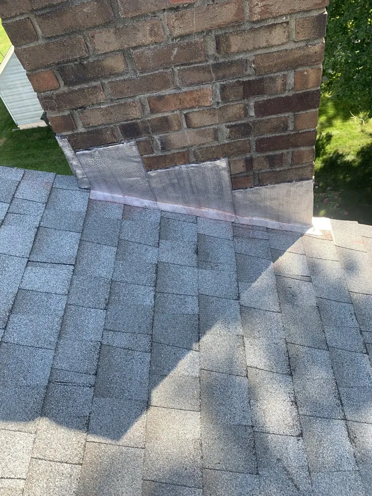 Slide of MGT Roofing Services