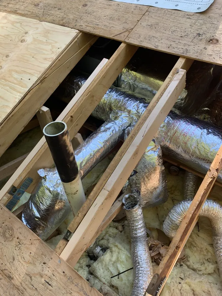 Slide of MGT Roofing Services