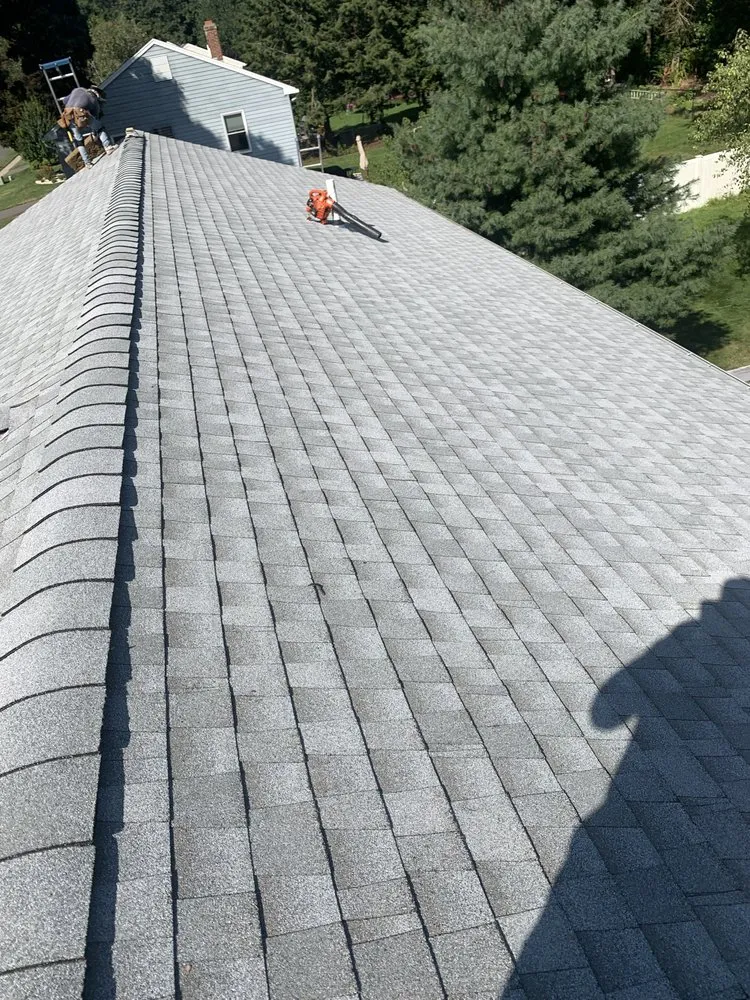 Slide of MGT Roofing Services