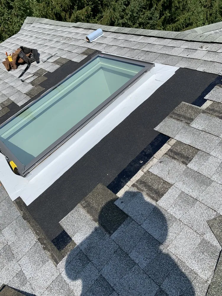 Slide of MGT Roofing Services